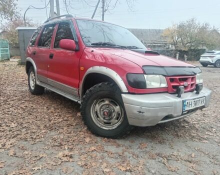 Червоний Кіа Sportage, об'ємом двигуна 2 л та пробігом 200 тис. км за 1310 $, фото 1 на Automoto.ua