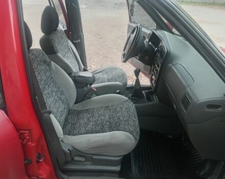 Червоний Кіа Sportage, об'ємом двигуна 2 л та пробігом 200 тис. км за 1310 $, фото 6 на Automoto.ua