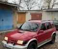 Красный Киа Sportage, объемом двигателя 2 л и пробегом 200 тыс. км за 1000 $, фото 1 на Automoto.ua