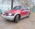 Червоний Кіа Sportage, об'ємом двигуна 2 л та пробігом 200 тис. км за 1310 $, фото 1 на Automoto.ua