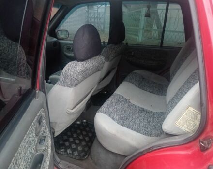 Червоний Кіа Sportage, об'ємом двигуна 2 л та пробігом 200 тис. км за 1310 $, фото 4 на Automoto.ua