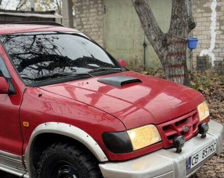 Красный Киа Sportage, объемом двигателя 2 л и пробегом 200 тыс. км за 1000 $, фото 3 на Automoto.ua