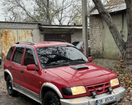 Красный Киа Sportage, объемом двигателя 2 л и пробегом 200 тыс. км за 1000 $, фото 2 на Automoto.ua