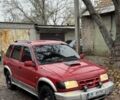 Красный Киа Sportage, объемом двигателя 2 л и пробегом 200 тыс. км за 1000 $, фото 2 на Automoto.ua