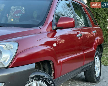 Червоний Кіа Sportage, об'ємом двигуна 2 л та пробігом 300 тис. км за 5999 $, фото 5 на Automoto.ua