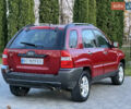 Червоний Кіа Sportage, об'ємом двигуна 2 л та пробігом 300 тис. км за 5999 $, фото 24 на Automoto.ua