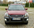 Красный Киа Sportage, объемом двигателя 2.66 л и пробегом 275 тыс. км за 7500 $, фото 5 на Automoto.ua