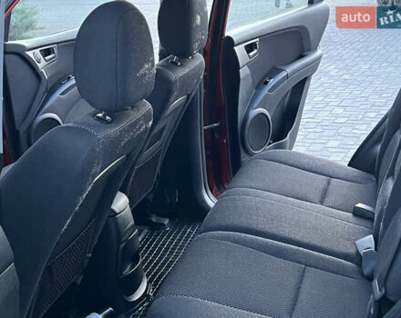 Червоний Кіа Sportage, об'ємом двигуна 2 л та пробігом 300 тис. км за 5999 $, фото 35 на Automoto.ua