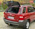 Красный Киа Sportage, объемом двигателя 2.66 л и пробегом 275 тыс. км за 7500 $, фото 24 на Automoto.ua