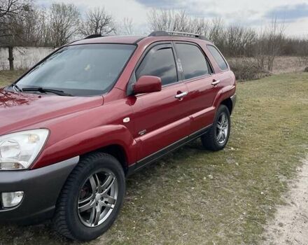 Красный Киа Sportage, объемом двигателя 1.99 л и пробегом 224 тыс. км за 7799 $, фото 25 на Automoto.ua