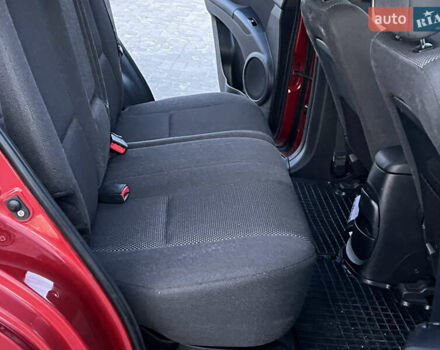 Червоний Кіа Sportage, об'ємом двигуна 2 л та пробігом 300 тис. км за 5999 $, фото 32 на Automoto.ua