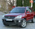 Червоний Кіа Sportage, об'ємом двигуна 2 л та пробігом 300 тис. км за 5999 $, фото 2 на Automoto.ua