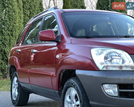 Червоний Кіа Sportage, об'ємом двигуна 2 л та пробігом 300 тис. км за 5999 $, фото 14 на Automoto.ua