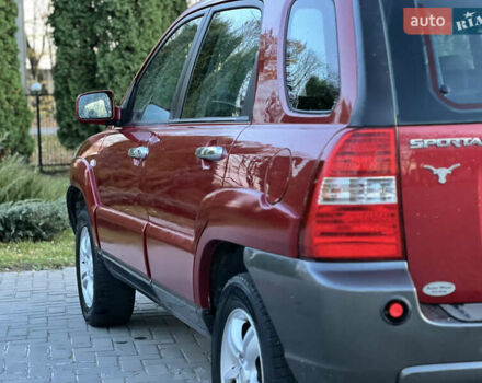 Червоний Кіа Sportage, об'ємом двигуна 2 л та пробігом 300 тис. км за 5999 $, фото 25 на Automoto.ua