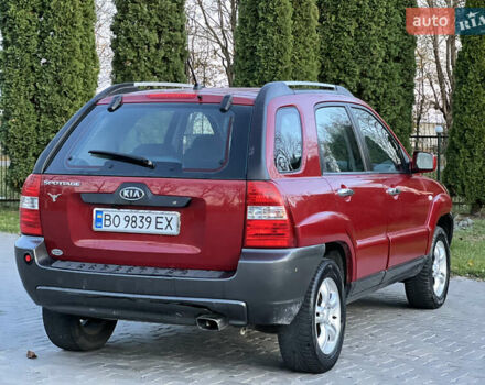Червоний Кіа Sportage, об'ємом двигуна 2 л та пробігом 300 тис. км за 5999 $, фото 23 на Automoto.ua