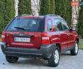 Червоний Кіа Sportage, об'ємом двигуна 2 л та пробігом 300 тис. км за 5999 $, фото 23 на Automoto.ua