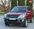 Червоний Кіа Sportage, об'ємом двигуна 2 л та пробігом 300 тис. км за 5999 $, фото 9 на Automoto.ua