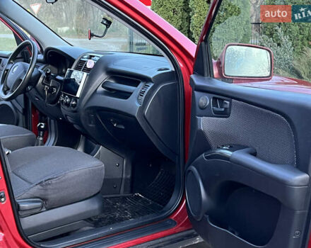 Червоний Кіа Sportage, об'ємом двигуна 2 л та пробігом 300 тис. км за 5999 $, фото 30 на Automoto.ua