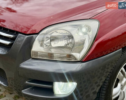 Красный Киа Sportage, объемом двигателя 2.66 л и пробегом 275 тыс. км за 7500 $, фото 21 на Automoto.ua