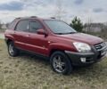 Красный Киа Sportage, объемом двигателя 1.99 л и пробегом 224 тыс. км за 7799 $, фото 1 на Automoto.ua