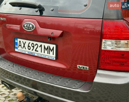 Красный Киа Sportage, объемом двигателя 2.66 л и пробегом 275 тыс. км за 7500 $, фото 14 на Automoto.ua