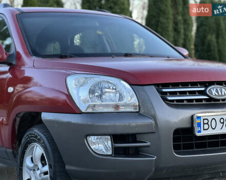 Червоний Кіа Sportage, об'ємом двигуна 2 л та пробігом 300 тис. км за 5999 $, фото 13 на Automoto.ua