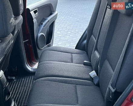 Червоний Кіа Sportage, об'ємом двигуна 2 л та пробігом 300 тис. км за 5999 $, фото 34 на Automoto.ua