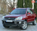 Червоний Кіа Sportage, об'ємом двигуна 2 л та пробігом 300 тис. км за 5999 $, фото 1 на Automoto.ua