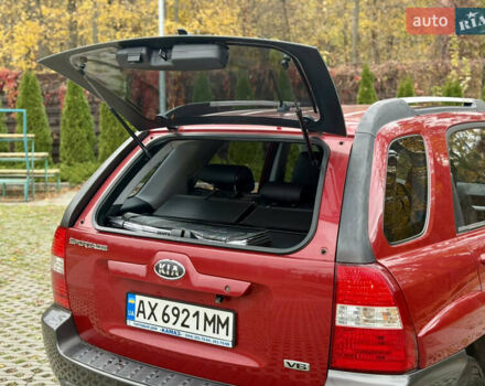 Красный Киа Sportage, объемом двигателя 2.66 л и пробегом 275 тыс. км за 7500 $, фото 25 на Automoto.ua