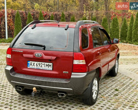 Красный Киа Sportage, объемом двигателя 2.66 л и пробегом 275 тыс. км за 7500 $, фото 11 на Automoto.ua