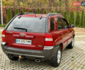 Красный Киа Sportage, объемом двигателя 2.66 л и пробегом 275 тыс. км за 7500 $, фото 11 на Automoto.ua