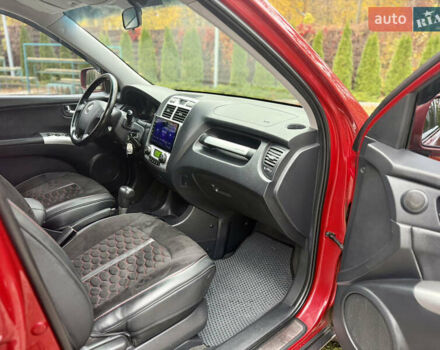 Красный Киа Sportage, объемом двигателя 2.66 л и пробегом 275 тыс. км за 7500 $, фото 29 на Automoto.ua