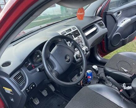 Красный Киа Sportage, объемом двигателя 1.99 л и пробегом 224 тыс. км за 7799 $, фото 23 на Automoto.ua