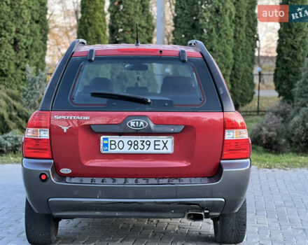 Червоний Кіа Sportage, об'ємом двигуна 2 л та пробігом 300 тис. км за 5999 $, фото 22 на Automoto.ua