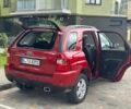 Красный Киа Sportage, объемом двигателя 2 л и пробегом 222 тыс. км за 8500 $, фото 1 на Automoto.ua