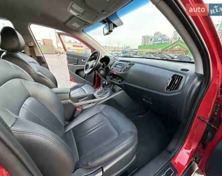 Червоний Кіа Sportage, об'ємом двигуна 2 л та пробігом 150 тис. км за 13500 $, фото 46 на Automoto.ua