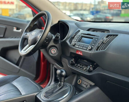 Червоний Кіа Sportage, об'ємом двигуна 2 л та пробігом 150 тис. км за 13500 $, фото 47 на Automoto.ua