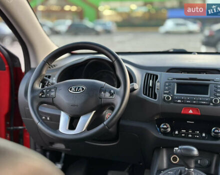 Червоний Кіа Sportage, об'ємом двигуна 2 л та пробігом 150 тис. км за 13500 $, фото 57 на Automoto.ua