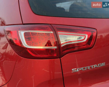 Червоний Кіа Sportage, об'ємом двигуна 2 л та пробігом 150 тис. км за 13500 $, фото 24 на Automoto.ua