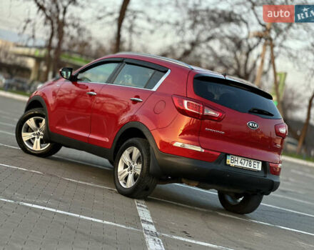 Червоний Кіа Sportage, об'ємом двигуна 2 л та пробігом 150 тис. км за 13500 $, фото 12 на Automoto.ua