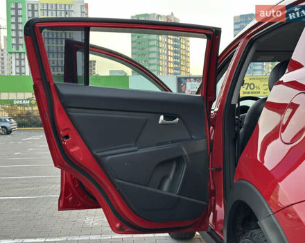 Червоний Кіа Sportage, об'ємом двигуна 2 л та пробігом 150 тис. км за 13500 $, фото 36 на Automoto.ua
