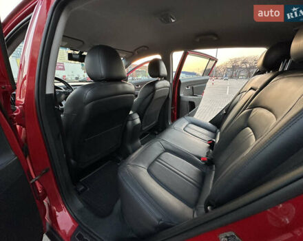 Червоний Кіа Sportage, об'ємом двигуна 2 л та пробігом 150 тис. км за 13500 $, фото 39 на Automoto.ua