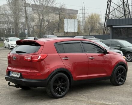 Красный Киа Sportage, объемом двигателя 2.4 л и пробегом 280 тыс. км за 9700 $, фото 3 на Automoto.ua