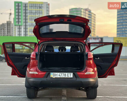 Червоний Кіа Sportage, об'ємом двигуна 2 л та пробігом 150 тис. км за 13500 $, фото 29 на Automoto.ua