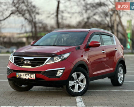 Червоний Кіа Sportage, об'ємом двигуна 2 л та пробігом 150 тис. км за 13500 $, фото 5 на Automoto.ua