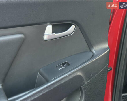 Червоний Кіа Sportage, об'ємом двигуна 2 л та пробігом 150 тис. км за 13500 $, фото 37 на Automoto.ua