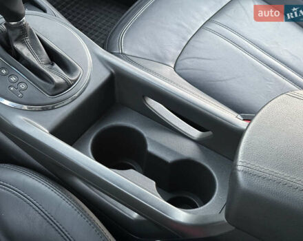 Червоний Кіа Sportage, об'ємом двигуна 2 л та пробігом 150 тис. км за 13500 $, фото 68 на Automoto.ua