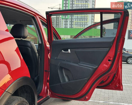 Червоний Кіа Sportage, об'ємом двигуна 2 л та пробігом 150 тис. км за 13500 $, фото 32 на Automoto.ua