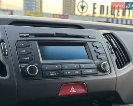 Червоний Кіа Sportage, об'ємом двигуна 2 л та пробігом 150 тис. км за 13500 $, фото 63 на Automoto.ua