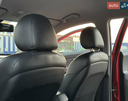 Червоний Кіа Sportage, об'ємом двигуна 2 л та пробігом 150 тис. км за 13500 $, фото 40 на Automoto.ua